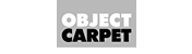 Logo von Object Carpet. Hellgraues Rechteckt mit Schriftzug oben weiß OBJECT und unten schwarz CARPET.